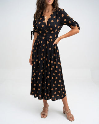 Clarisse | Robe midi à pois élégance naturelle